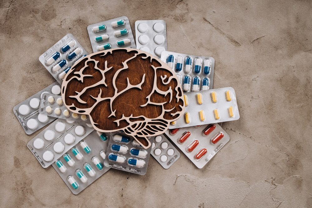 Brain icon on top of array of medications