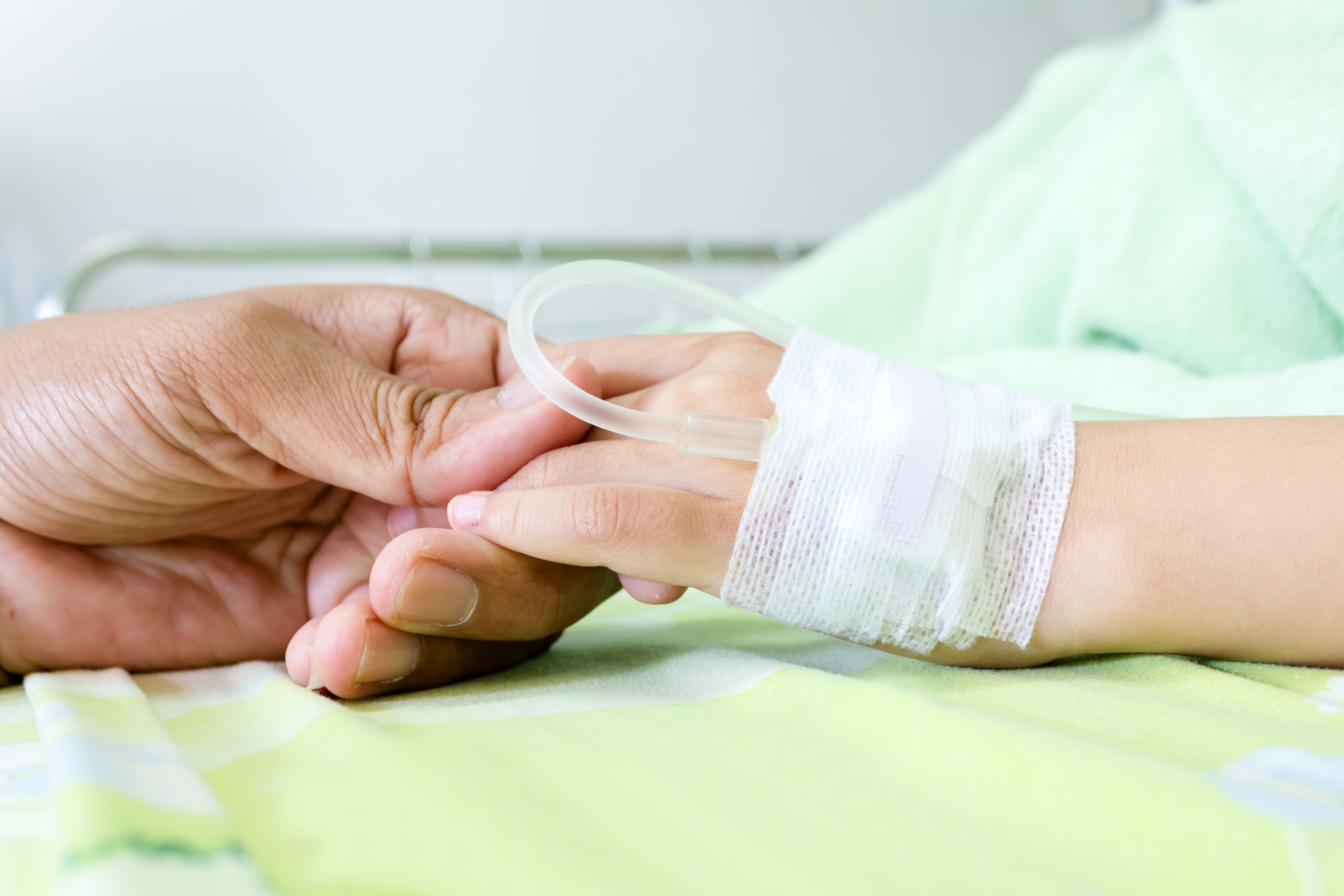 hospital_bed_holding_hands.jpg
